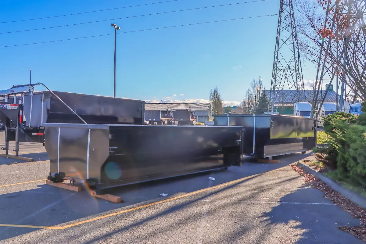 Roll-off dumpster ready for waste disposal at job site for 12 Yard Dumpster Rental in Little Silver